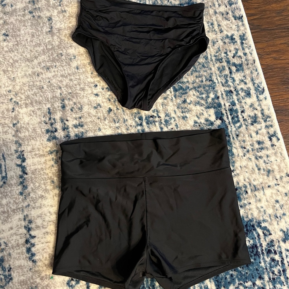 Two full coverage bathing suit bottoms.